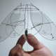 Illustration for article titled Four-Winged Flying Robot Drifts on Breezes Like an Airborne Jellyfish